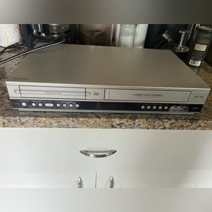 DVD/VCR player with about 50 classic Disney movies and others. Pickup only